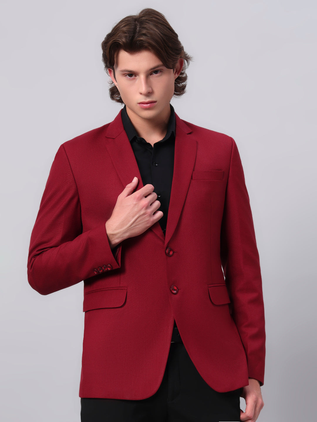 Bold red viscose blazer styled for standout formal look